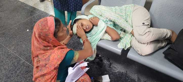 Malaria sufferers shivered outside the medicine department
