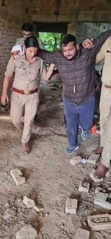 Two arrested in encounter, including one carrying a reward of 25,000