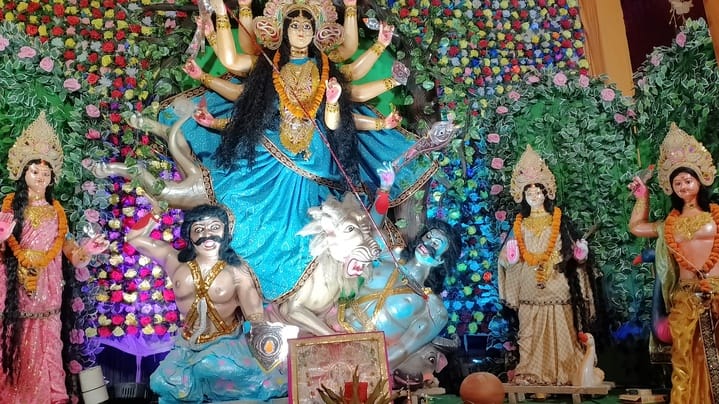 Worshiped Mahagauri and wished for happiness and prosperity.