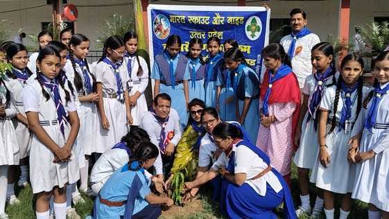 Scouts and Guides planted trees and gave the message of environmental protection.