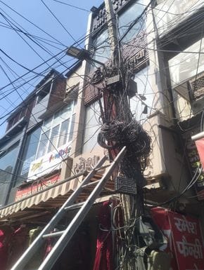 Wires tangled in crowded markets were removed from electricity poles and internet cables were cut