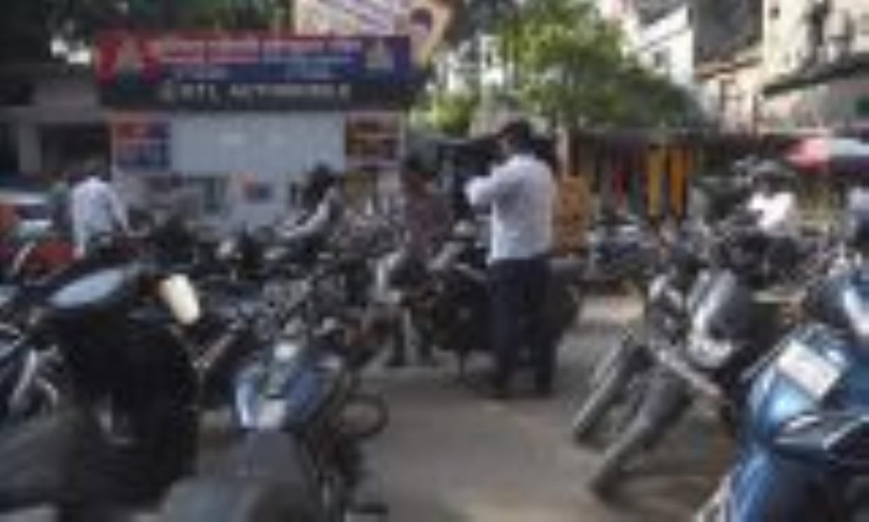 Parking and encroachment on the road saves eight feet on a 30-foot wide road.