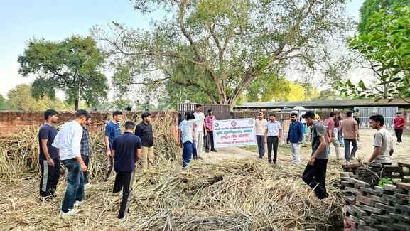NSS volunteers cleaned the cowshed.