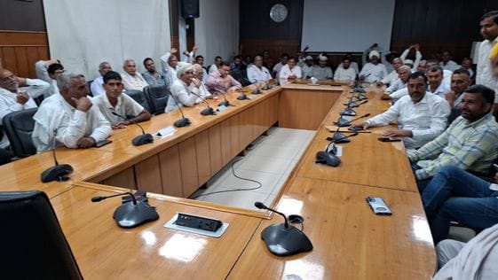 Farmers from 17 villages staged a sit-in in the DC conference room.