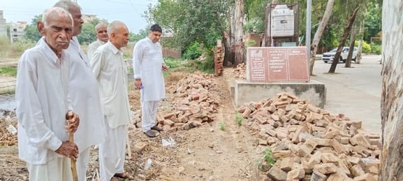 No attention is paid to the broken wall of the school