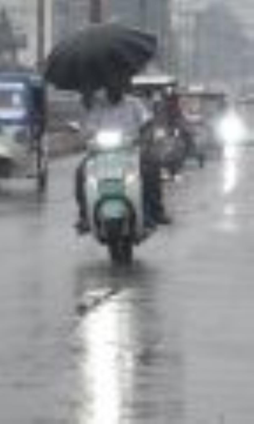 Drizzling showers treated the scorching heat