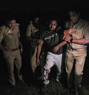A cattle smuggler carrying a reward of Rs 25,000 was arrested in an encounter.