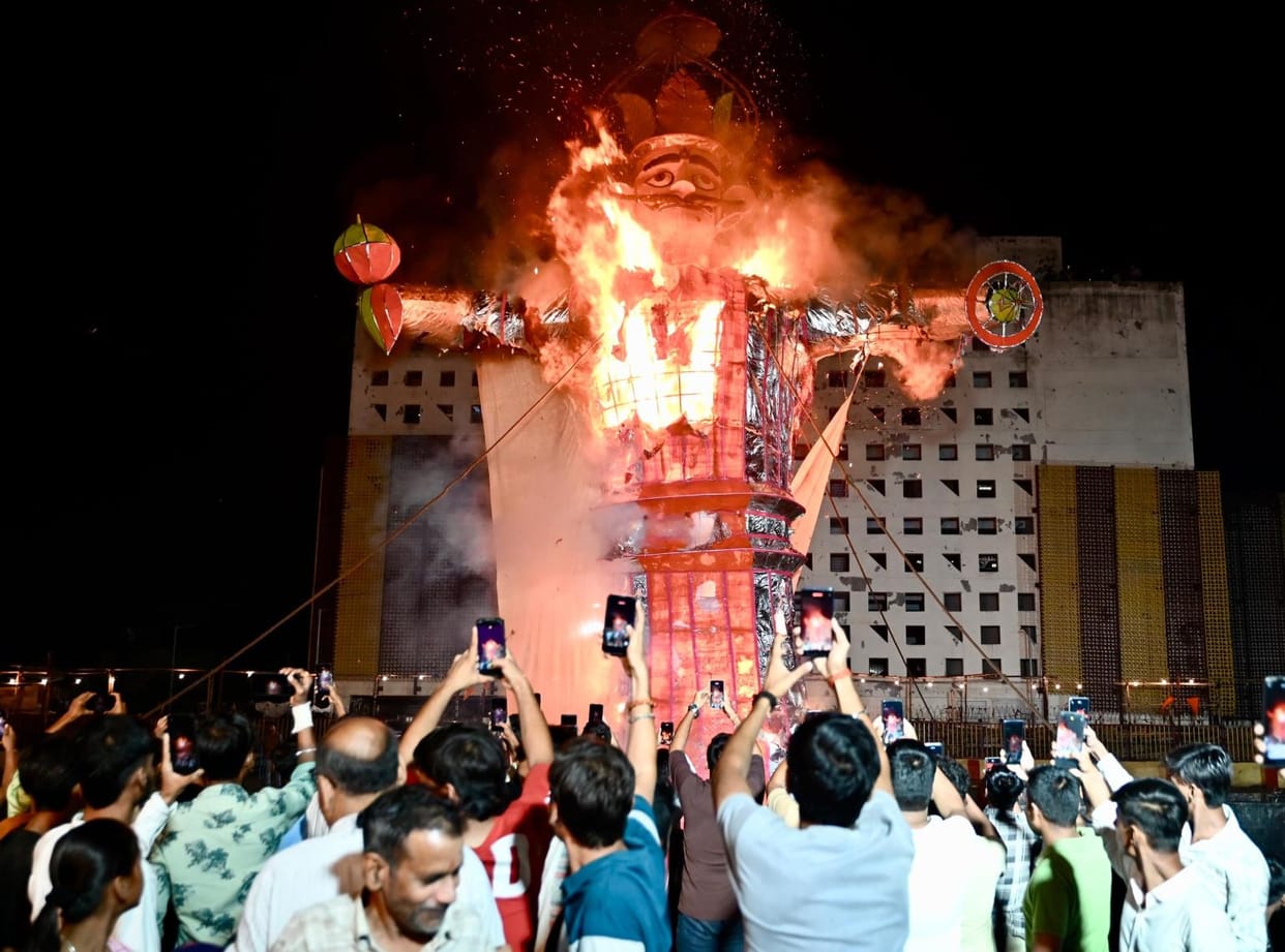 Kumbhakarna effigy soaked in rain all day, then burned at night