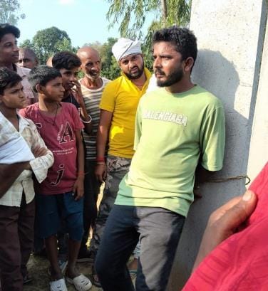 A young man was tied to a pole and beaten for molestation
