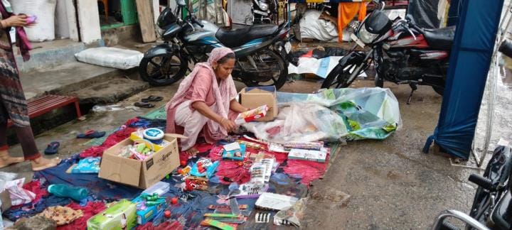 The rain has dampened the spirit of the fair, but the puja pandals remain vibrant.