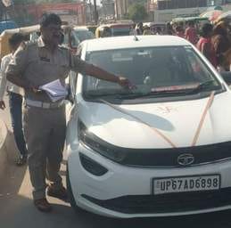 If the brother is a constable, he has Uttar Pradesh Government written on the vehicle