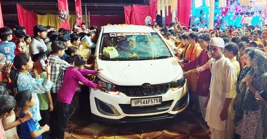 The devotees bid farewell to the flame with cheers.