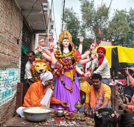 Devotees bid farewell to Mother Goddess by inviting her to come early next year