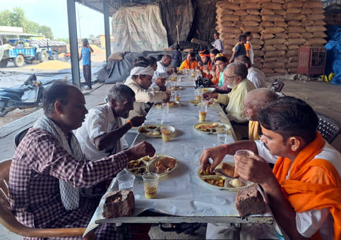 Grain traders organised a feast in the market.