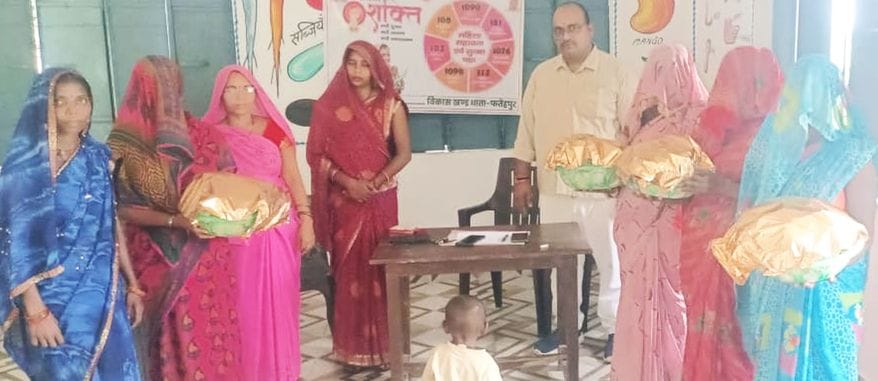 Women heads distributed nutrition to children