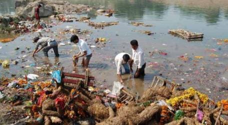 During immersion at the ghats, idols were disrespected, and their clothing and jewelry were stolen.