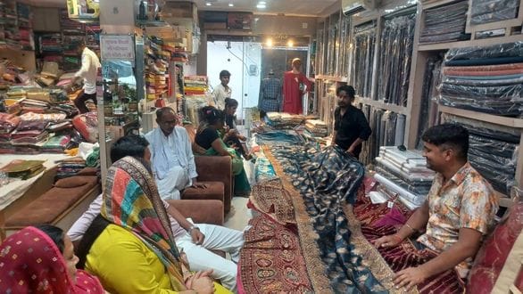 The saree-suit market is buzzing, with a lot of shopping going on.