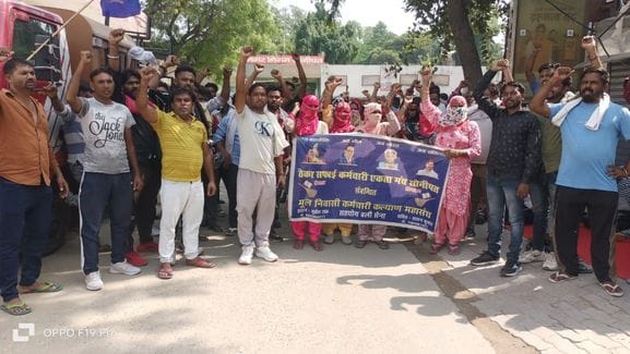 Contract sanitation workers staged a protest by taking out a procession