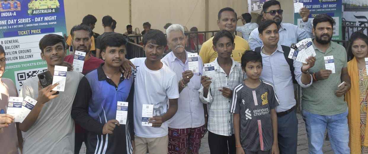 Crowds queue up at ticket counters to buy and exchange tickets.