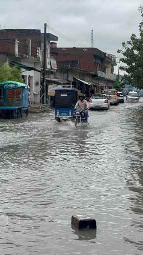 Continuous rain for 18 hours caused waterlogging, with roads filled with up to two feet of water.