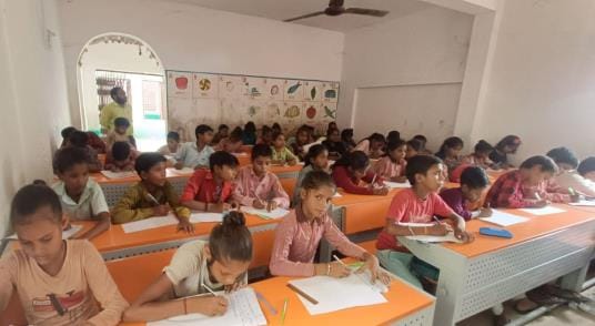 Children in 564 schools will now study sitting on desks and benches