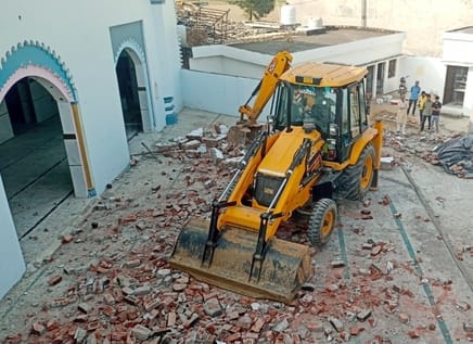 The front portion of the mosque was demolished, and now Muslims are using JCBs to demolish the interior.