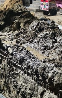 Water started leaking from the broken culvert due to road digging.