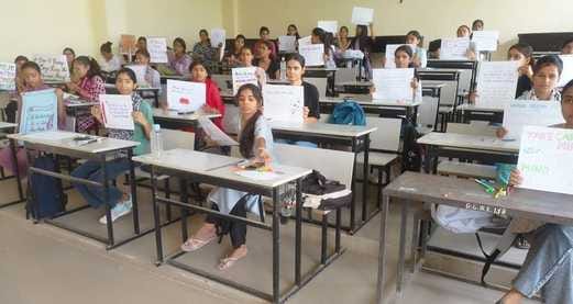 Surya tops in slogan writing and Honey Yadav tops in poster making