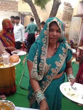 A mother who came to save her son was beaten to death with a stick