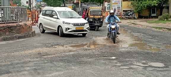 20 roads were patched during Navratri, but two days of rain created potholes again.