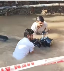 Bike falls into a ditch, young man and woman narrowly escape