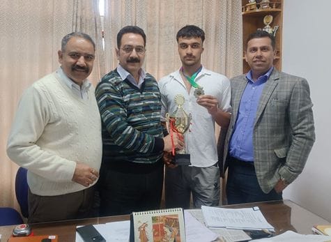 Akash of Theog College won silver medal in wrestling
