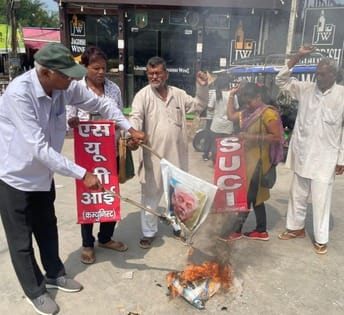 SUCI burns effigy of US President Trump