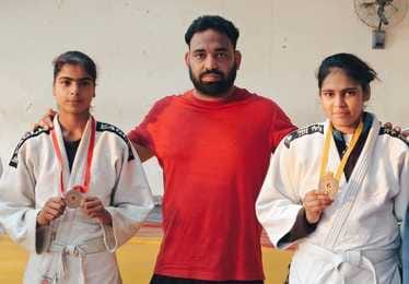 Dimple won the gold medal and Kirti won the silver medal.