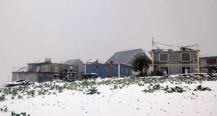Residential areas of Lahaul are covered with snow.