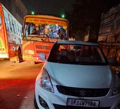 A young man was eating Birkhani after parking his car on the road, causing a traffic jam.