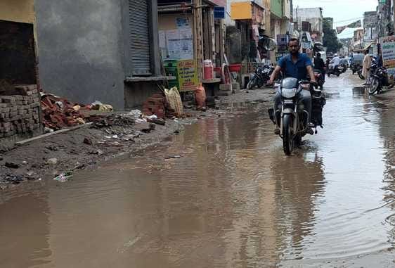 Waterlogging in Ganj Bazaar has caused problems for pedestrians and traders.