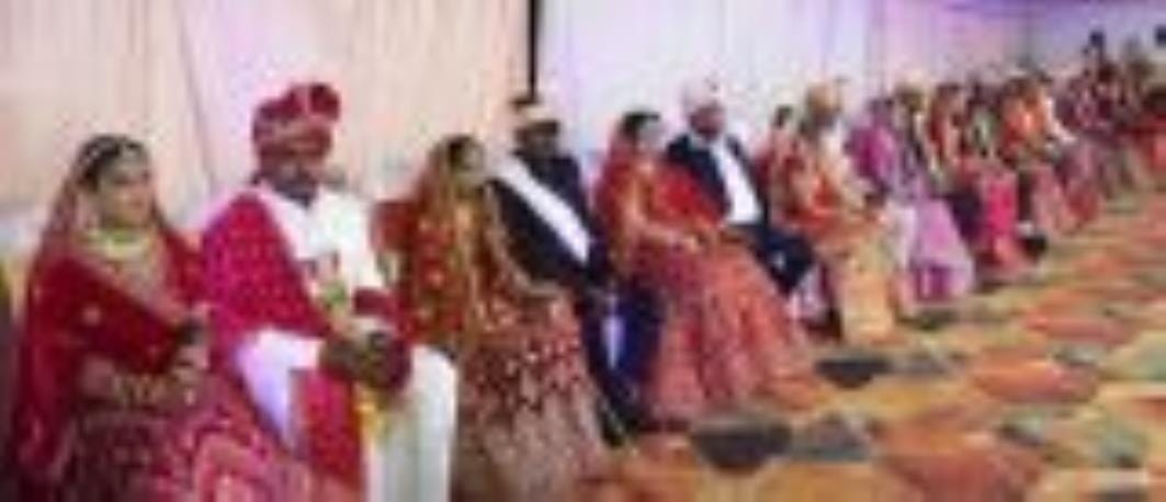 23 couples started a new life by taking seven rounds of fire.