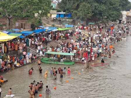 Took a dip in the Ganges chanting Har Har on the full moon day