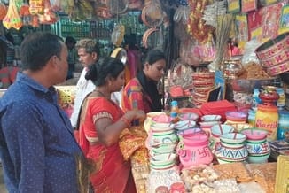 Karwa Chauth brings cheer to city markets, with women busy preparing for the festival