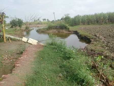 Villagers' lives stuck in potholes after floods
