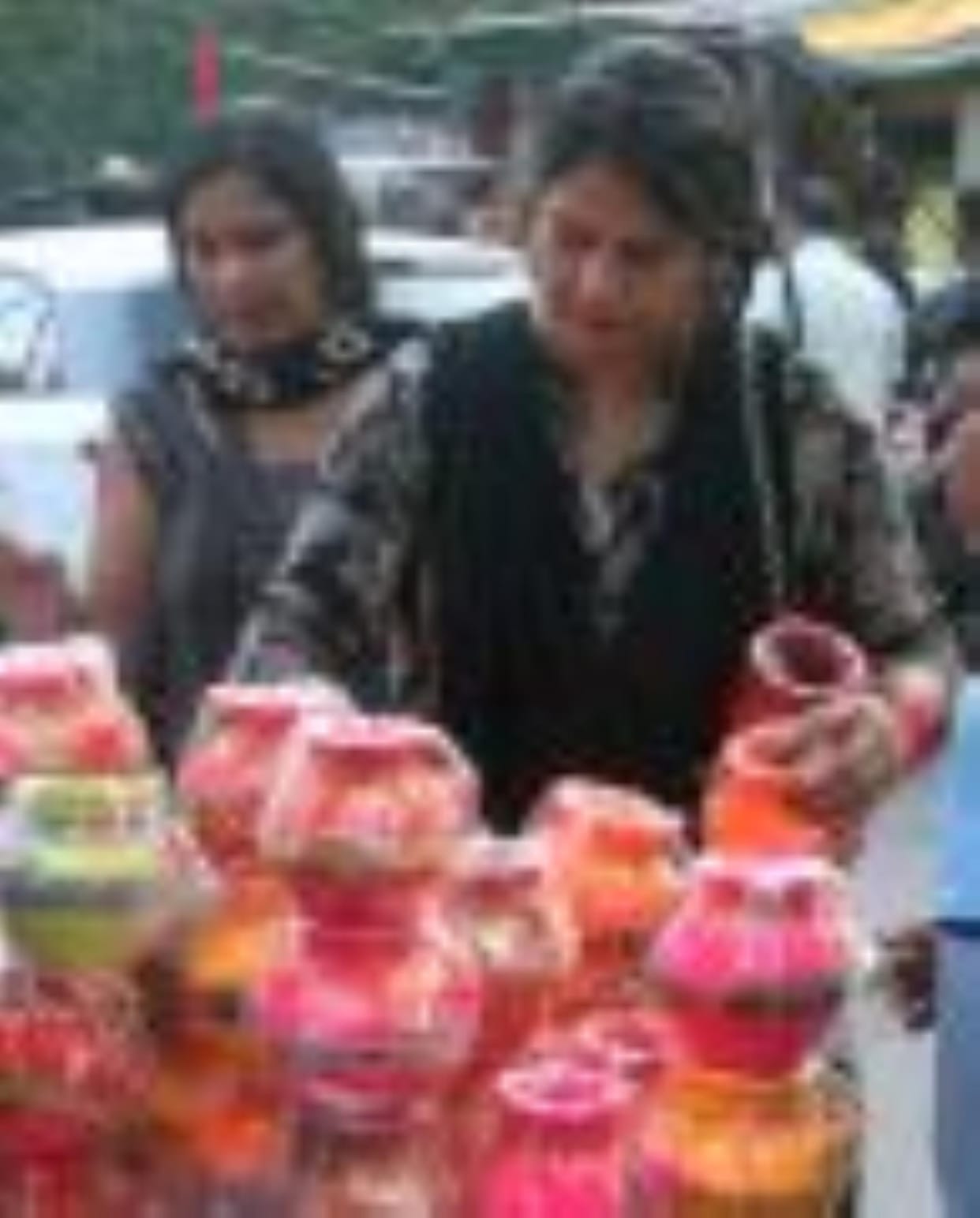 The market is decorated like a newlywed woman, earrings jingling, bangles clinking.