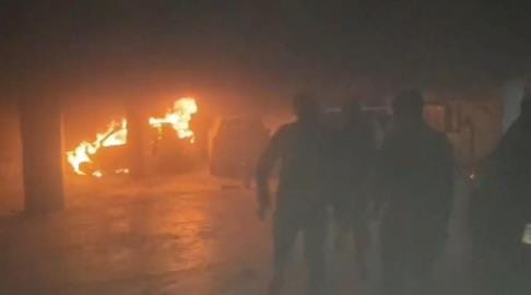 Two cars parked in the municipal parking lot caught fire.