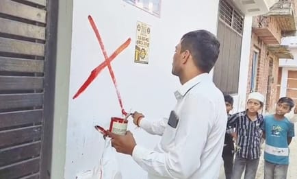 80 houses built on pond land, 40 marked with red flags for removal