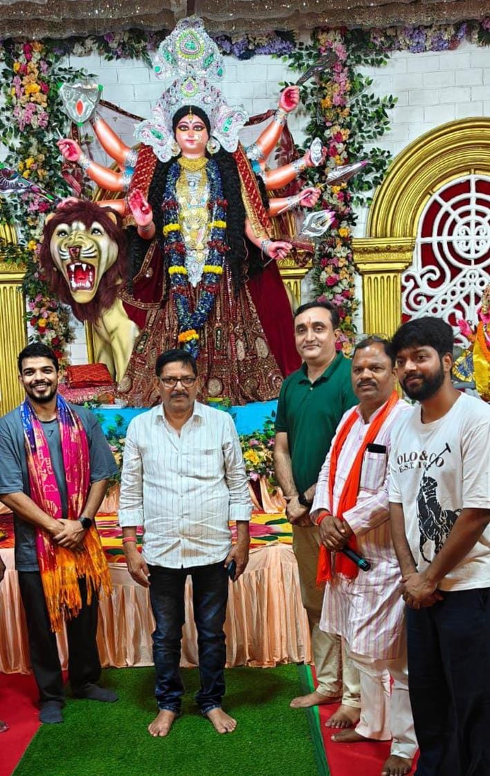 Goddess idols mounted on chariots for immersion, devotees emotional