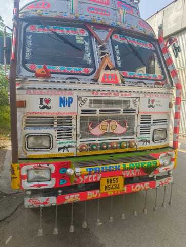 Truck driver killed, three injured in bike collision