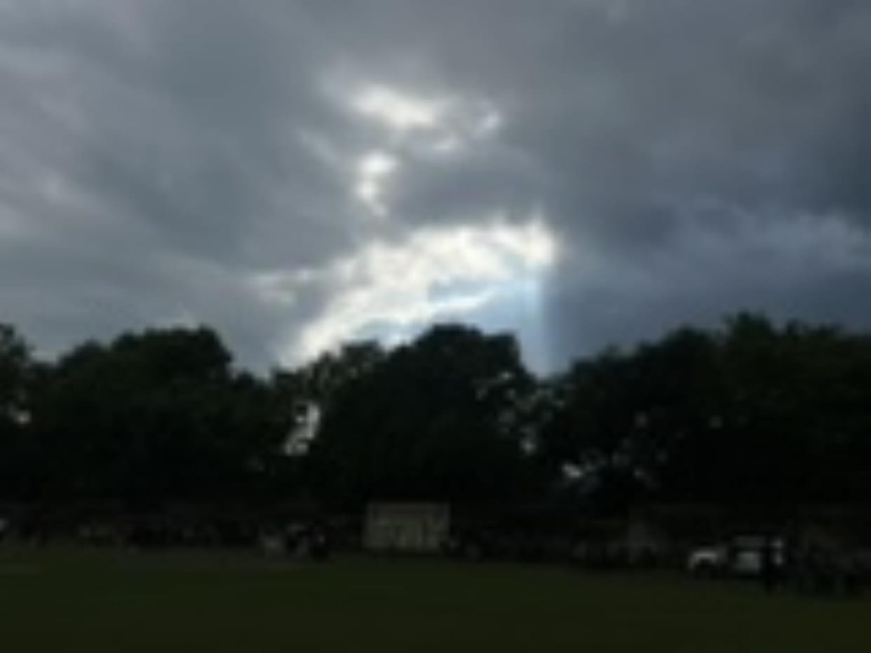 Dark clouds covered the sky.