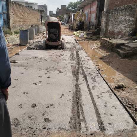 Workers and villagers clash over the quality of a road under construction