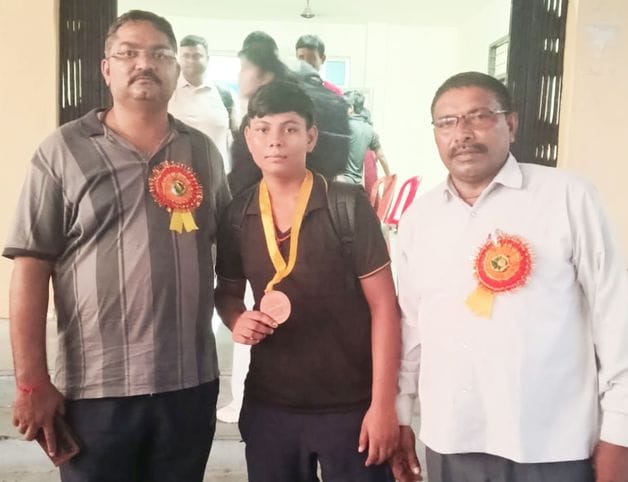 Radha won bronze in the state level wrestling competition