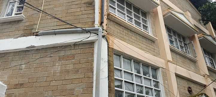 Chaos in the municipal corporation's own building, incomplete downpipe damaging walls